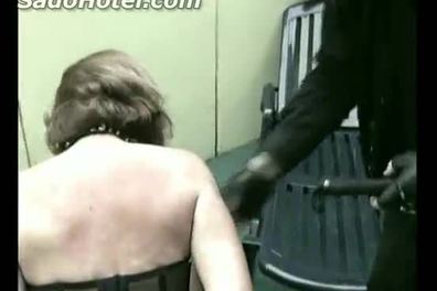 Old slave with good tits tied to chair got hit with a whip on her back and pussy by her master