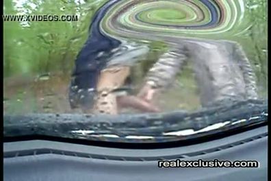 Handjob in car on a rainy day